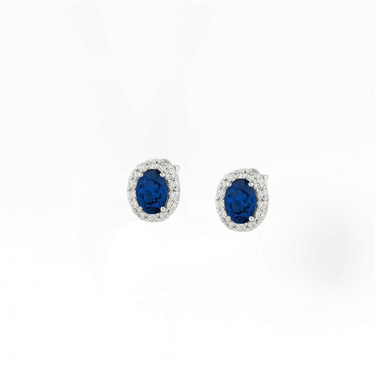 Infinite Blue: Minimalist Sapphire Halo Set - Yenny Jewels