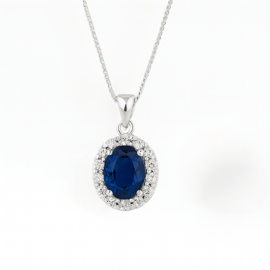 Infinite Blue: Minimalist Sapphire Halo Set - Yenny Jewels